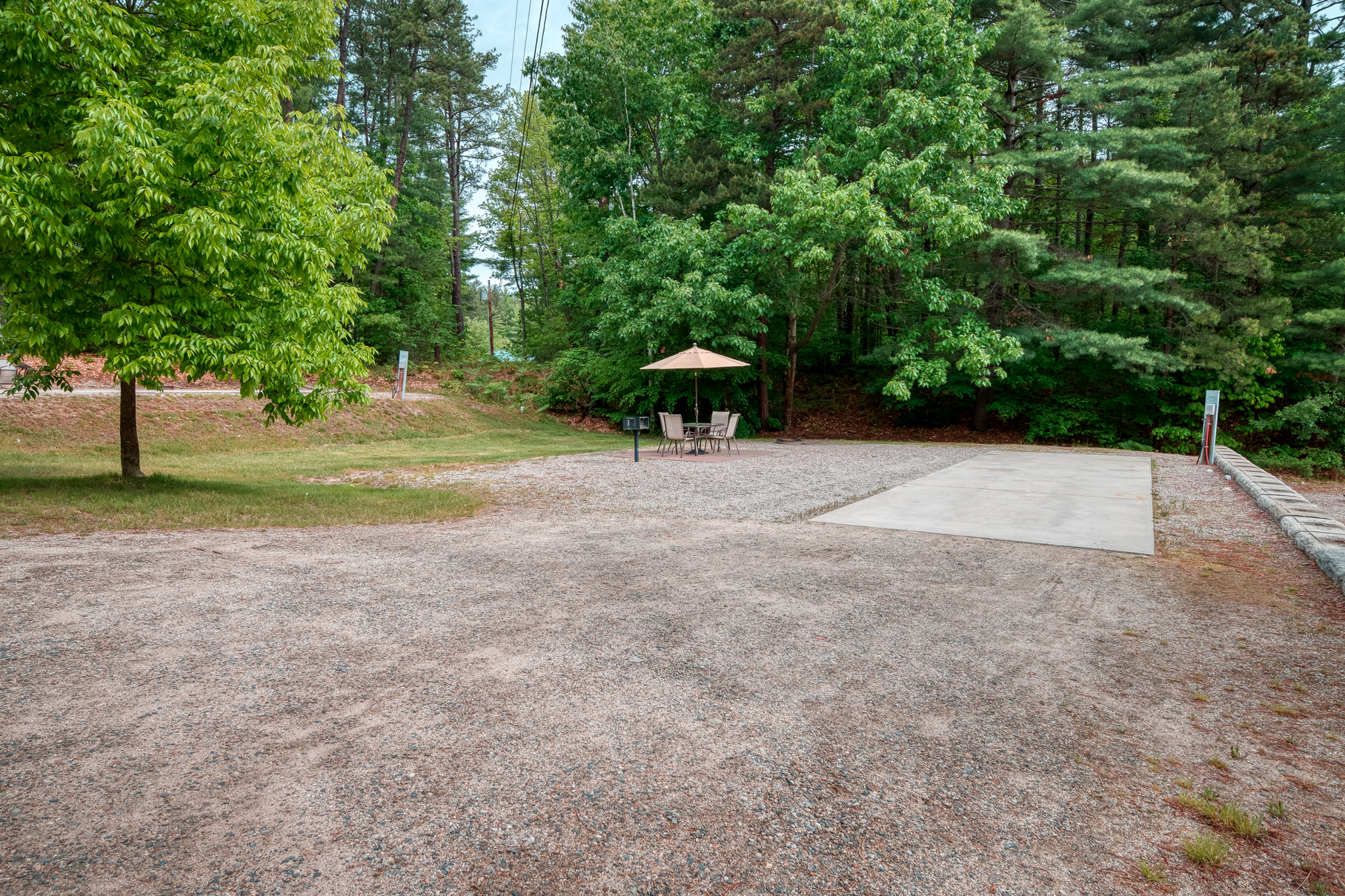 A view of a Deluxe full hook-up site at Danforth Bay Camping & RV Resort